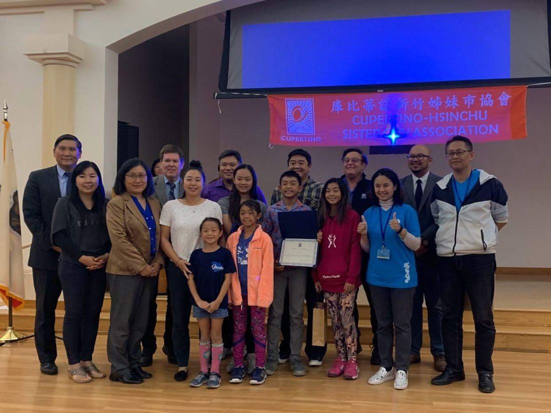 Group photo with hosts and organizers