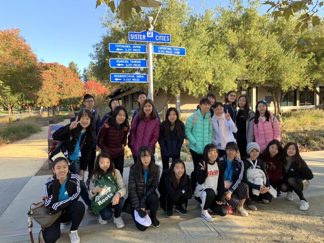 Group by the Sister Cities sign in Cupertino