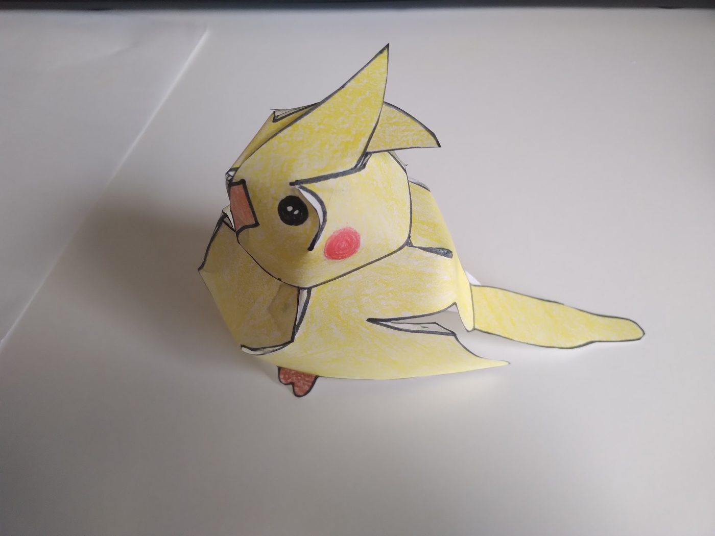 Paper craft cockatiel, side view