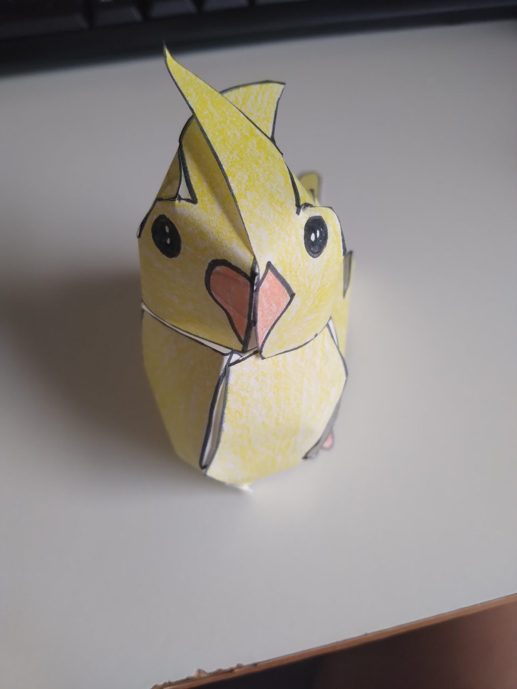 Paper craft cockatiel, front view