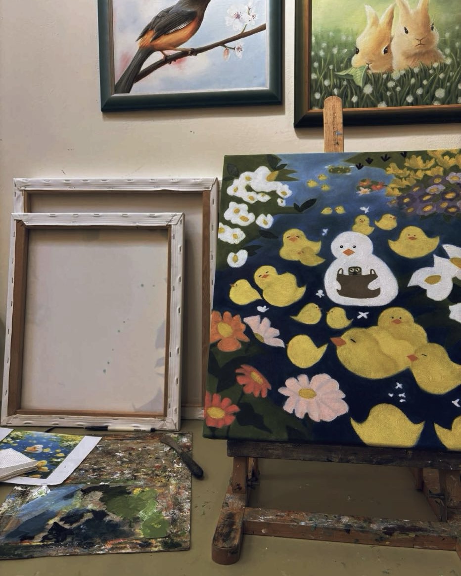 The duck oil painting, on the easel in the studio