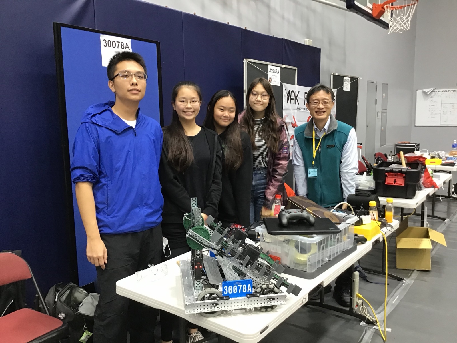 The team with our coach at the 2021 VEX Robotics Competition