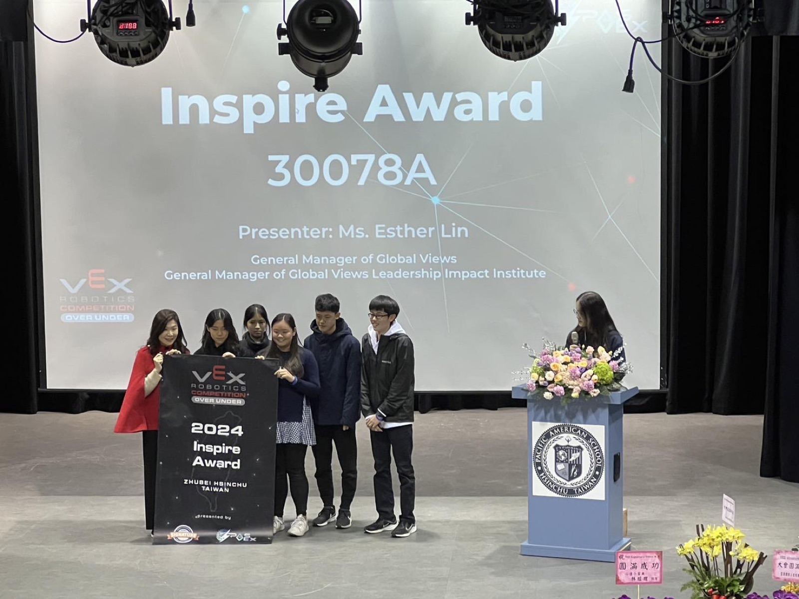 Team 30078A on stage receiving the Inspire Award at the PAS-VEX VRC Signature Event